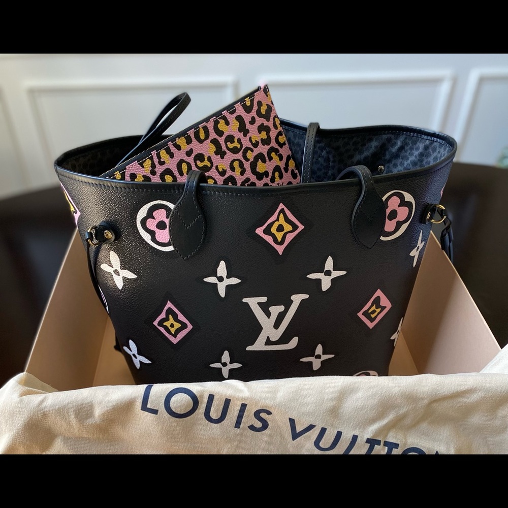 Excellent used Louis Vuitton MM Neverfull “Wild At Heart” Handbag. Looks New!